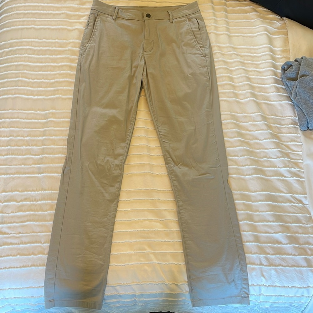 Slightly worn meds bird dog brand khaki pants size 30/32.